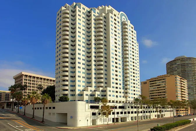 Commercial restoration by Angelus - Elastomeric Wall Coating System and waterproofing project at Harbor Place Tower, Long Beach