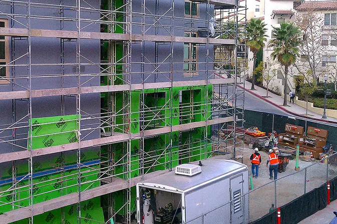 Angelus Waterproofing employees install fluid applied air barrier at UCLA Weyburn Graduate Housing